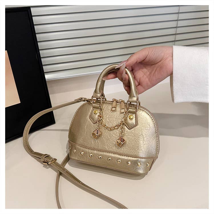 Fashionable riveted single-shoulder bag