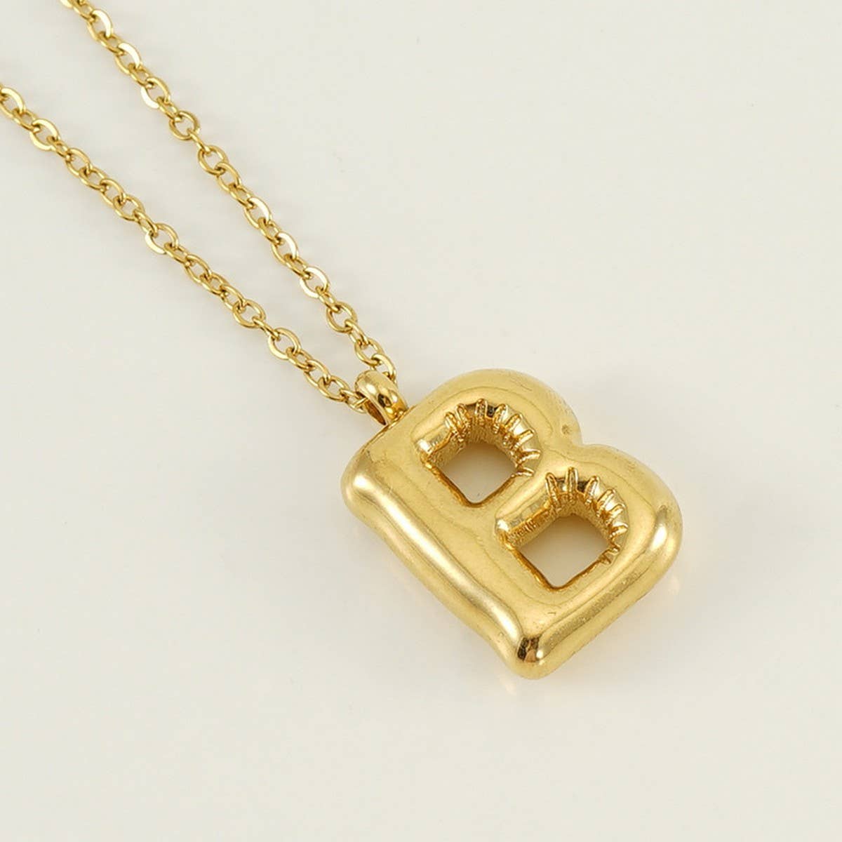 CWAJE1933_Stainless Steel Glossy Bubble Letter Necklace Gold