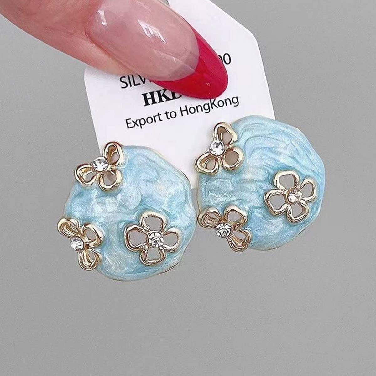 HOLLOW ZIRCON GEOMETRIC FLOWER EARRINGS