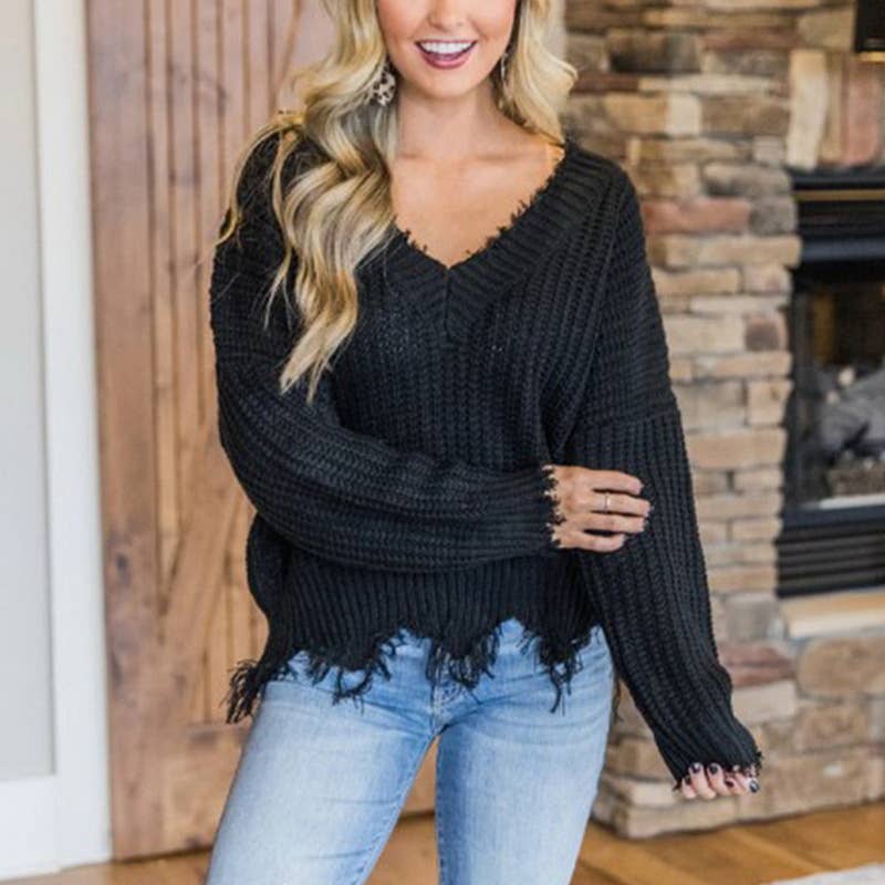 KNIT SWEATER WITH LARGE V-NECK FRINGE HEM