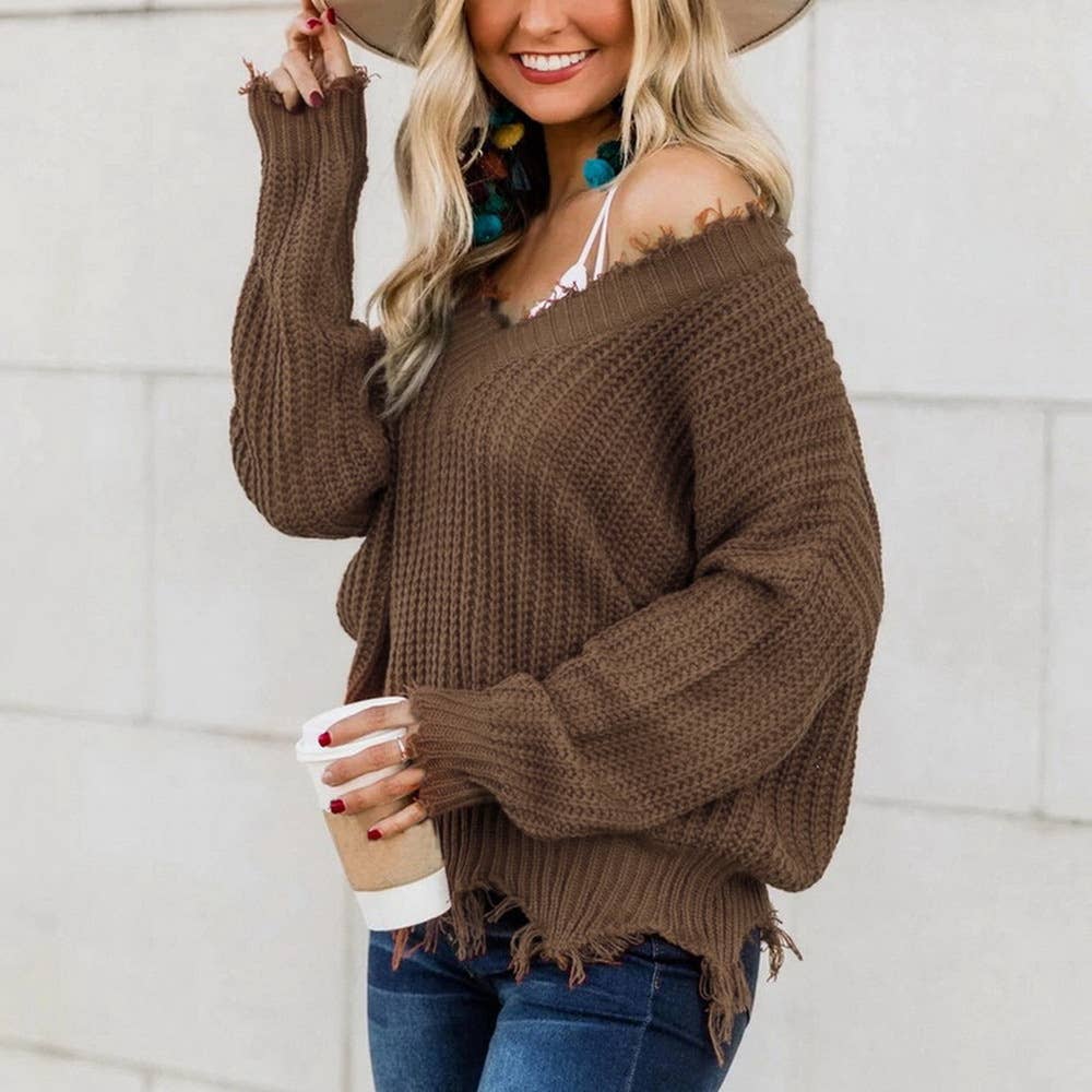 KNIT SWEATER WITH LARGE V-NECK FRINGE HEM