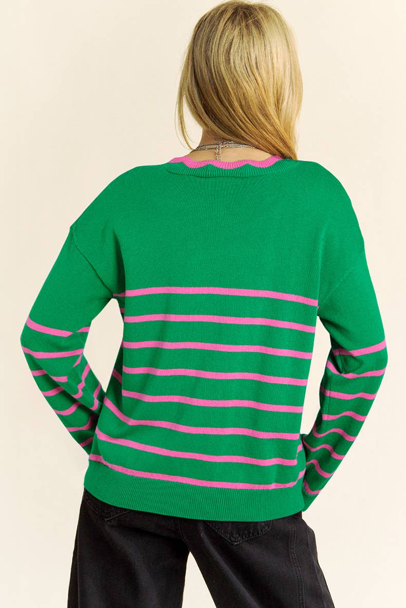 STYLISH AND PLAYFUL AGE-REDUCING BOW SWEATER
