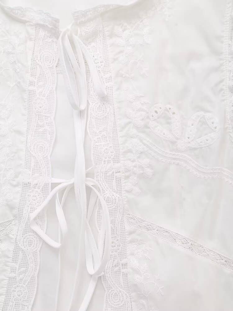 Fashion sleeveless bow tie tie embroidery top