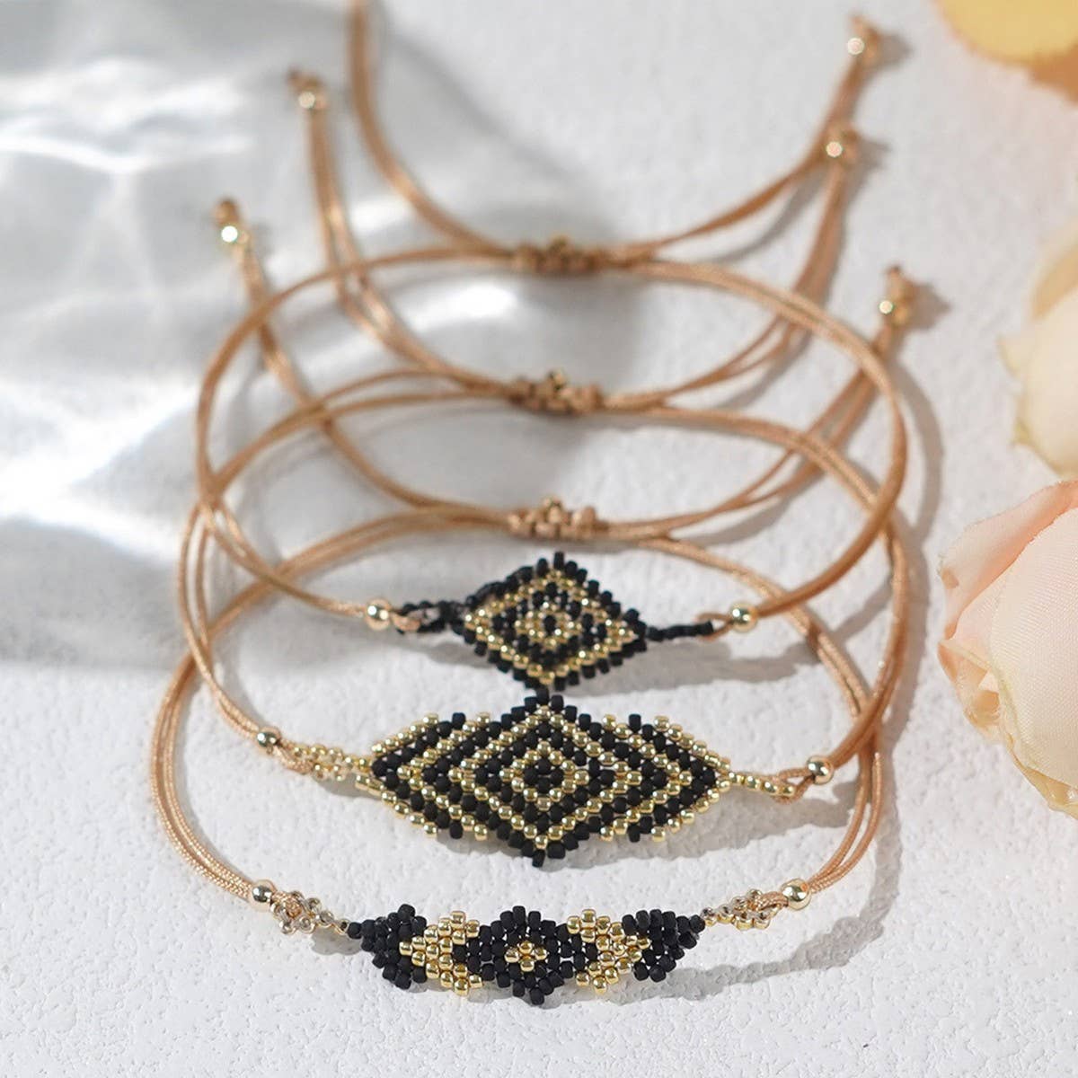 BRAIDED ARROW RICE BEAD BRACELET SET OF THREE_CWMM3884