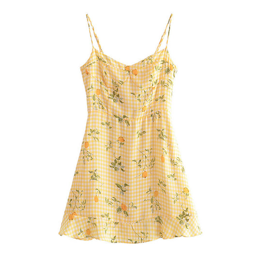 A strappy dress with floral prints and ruffles