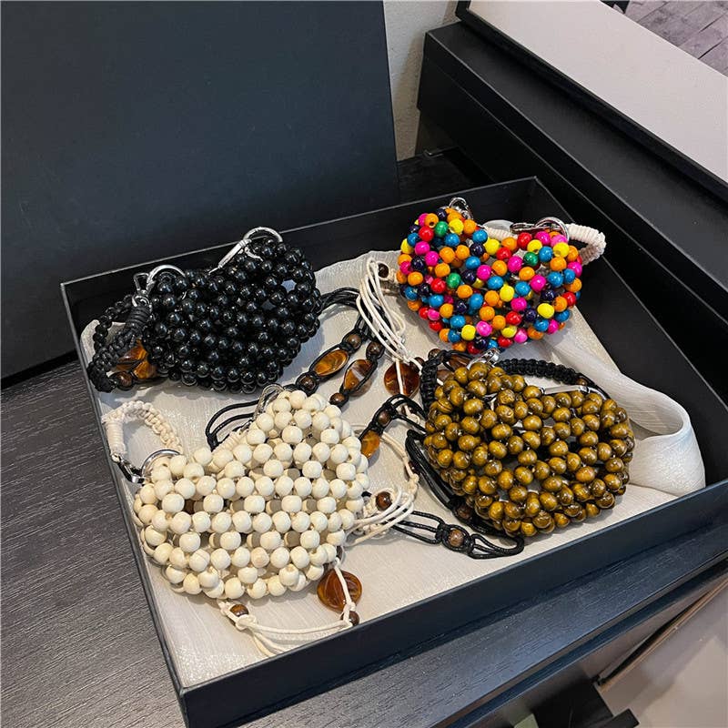 Hollowed-out and colorful beaded crossbody bag