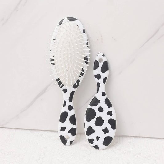 DUAL-PURPOSE CUTE CARTOON COW OVAL COMB