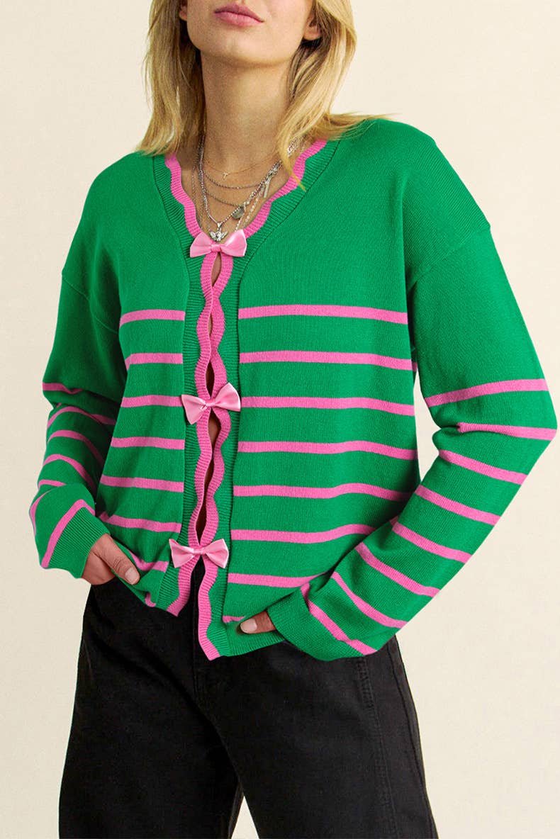 STYLISH AND PLAYFUL AGE-REDUCING BOW SWEATER