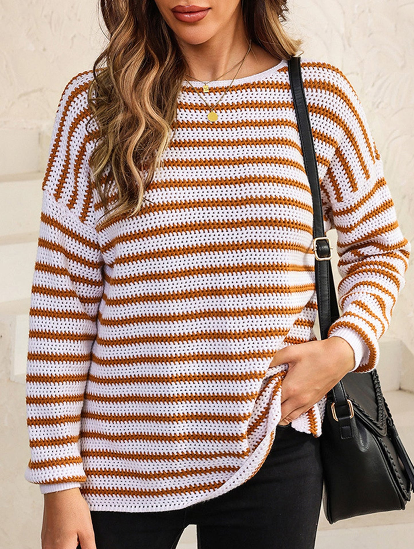 Loose-fitting turtleneck sweater with stripes