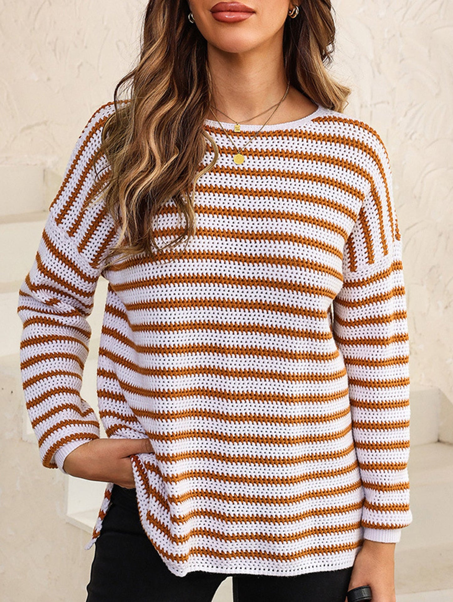 Loose-fitting turtleneck sweater with stripes