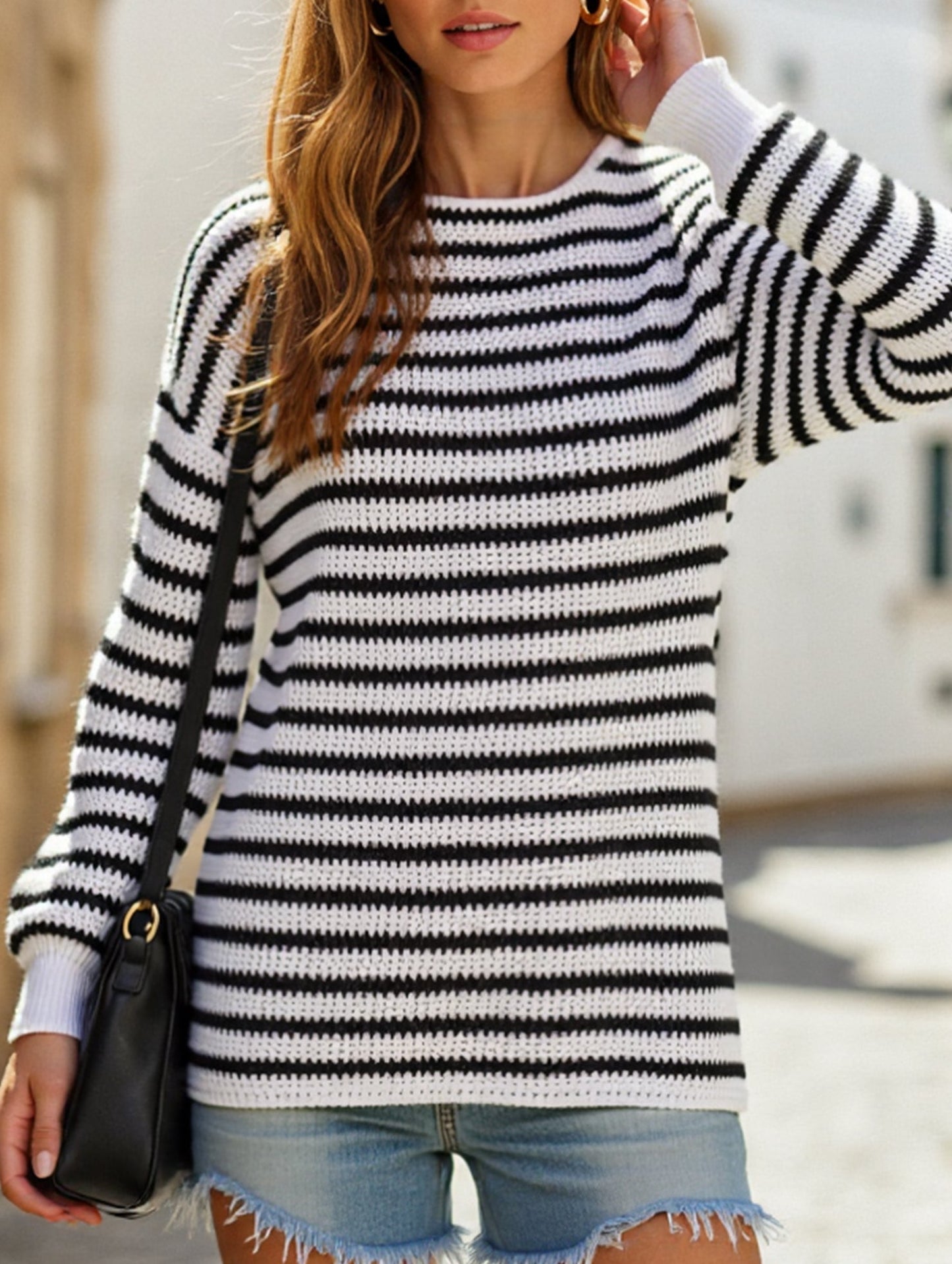 Loose-fitting turtleneck sweater with stripes