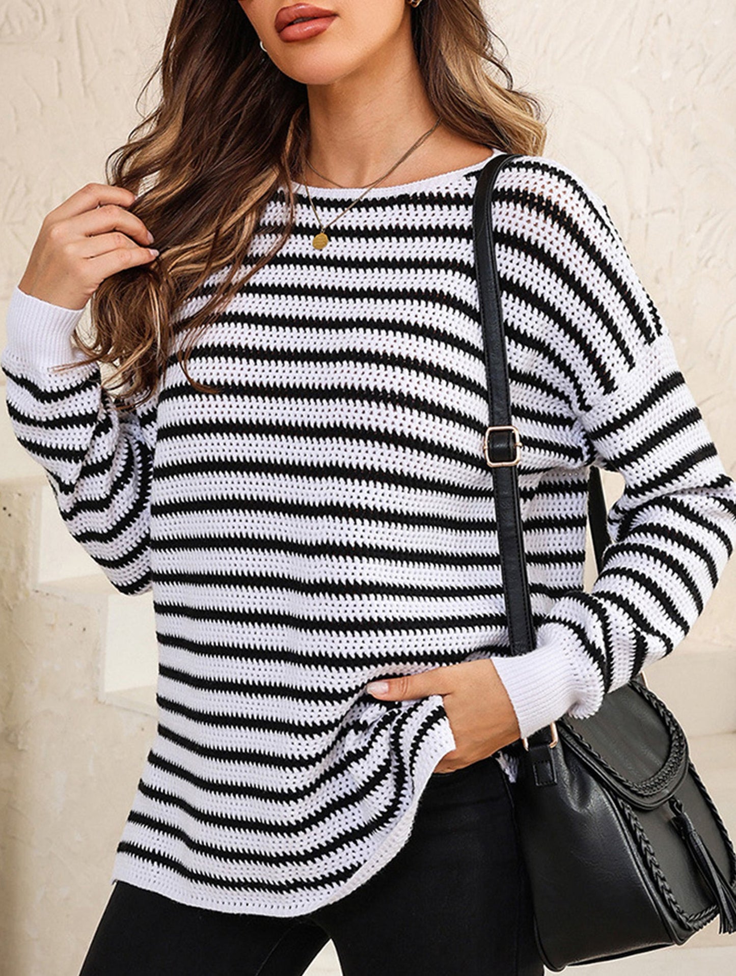 Loose-fitting turtleneck sweater with stripes