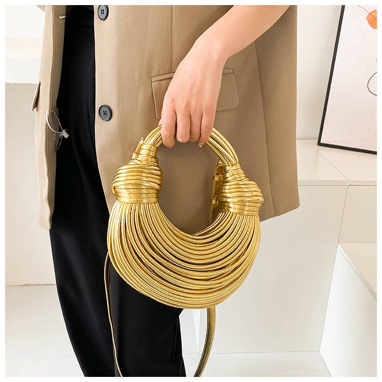 Metallic color striped appearance glossy handbag