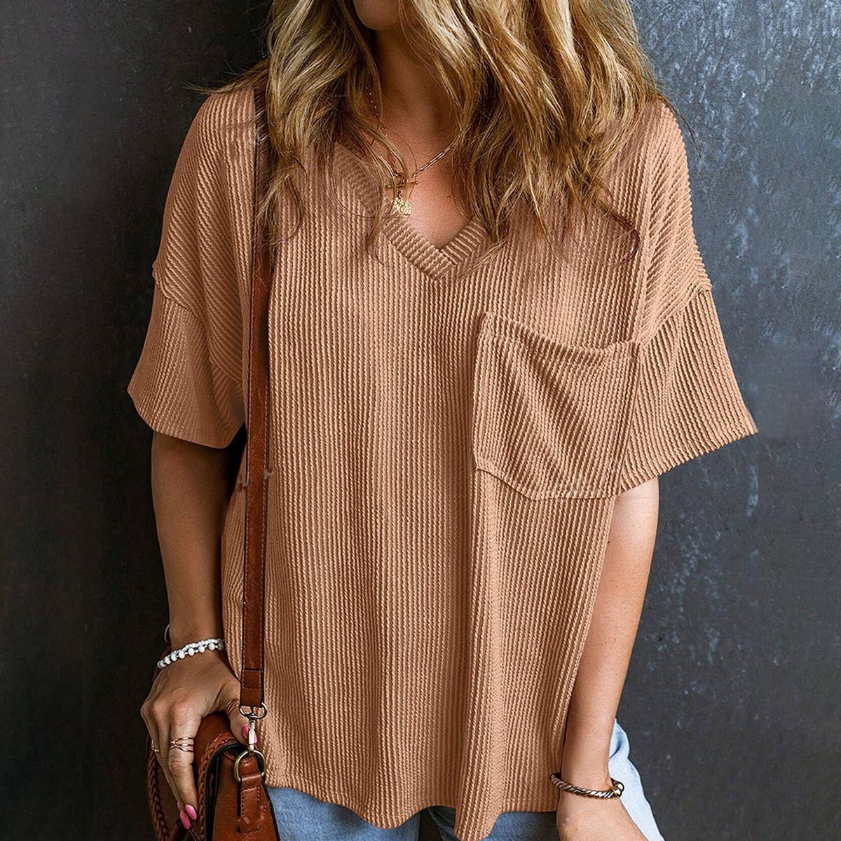 Stylish two-tone twist bullet pocket V-neck top