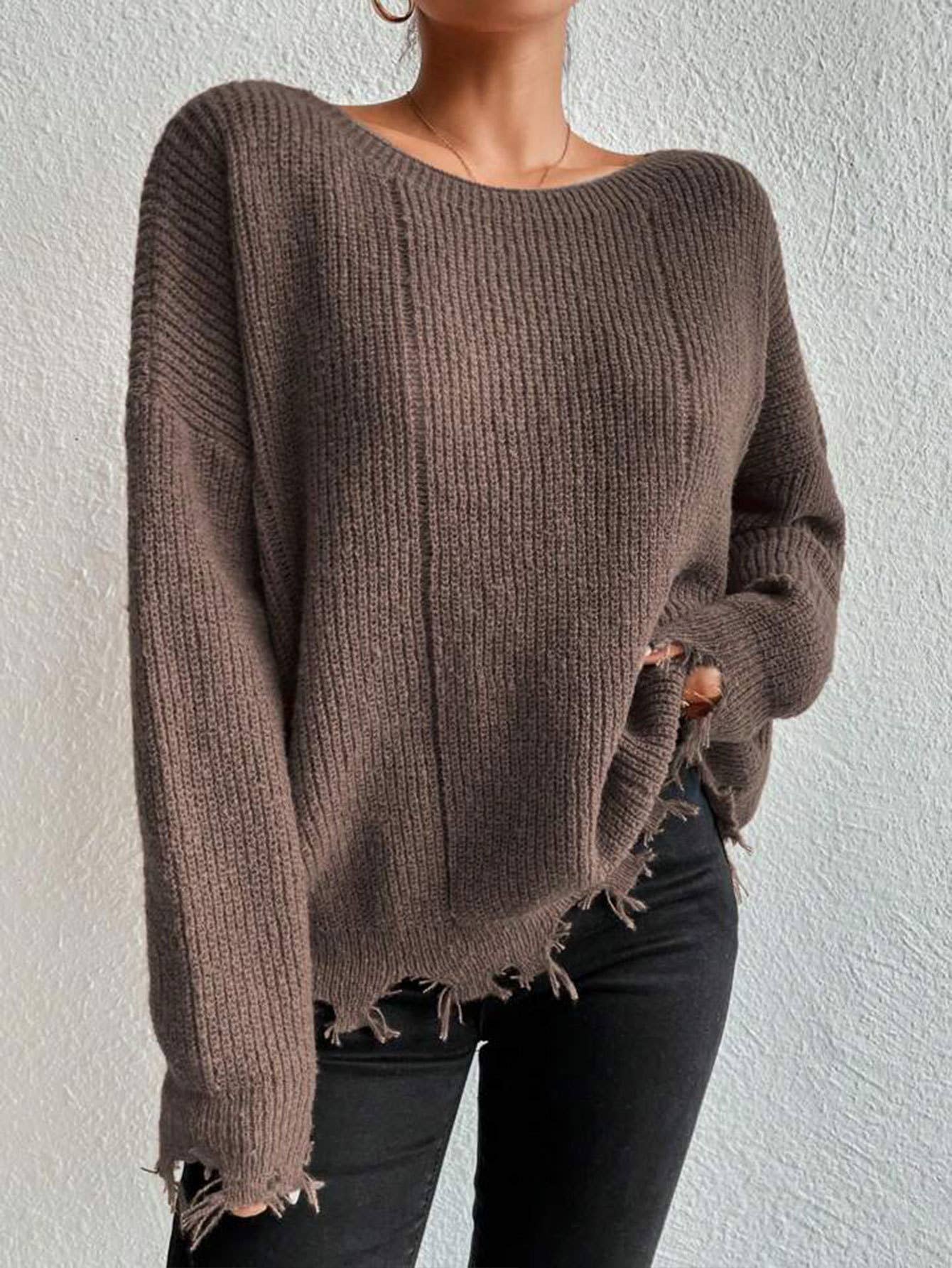 Laid-back style distressed frayed sweater