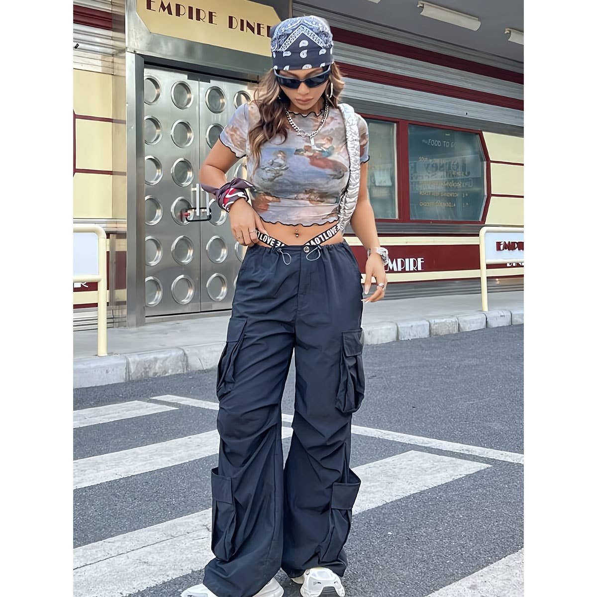 FLORAL PRINT MESH TOP WITH RUFFLE DETAILING