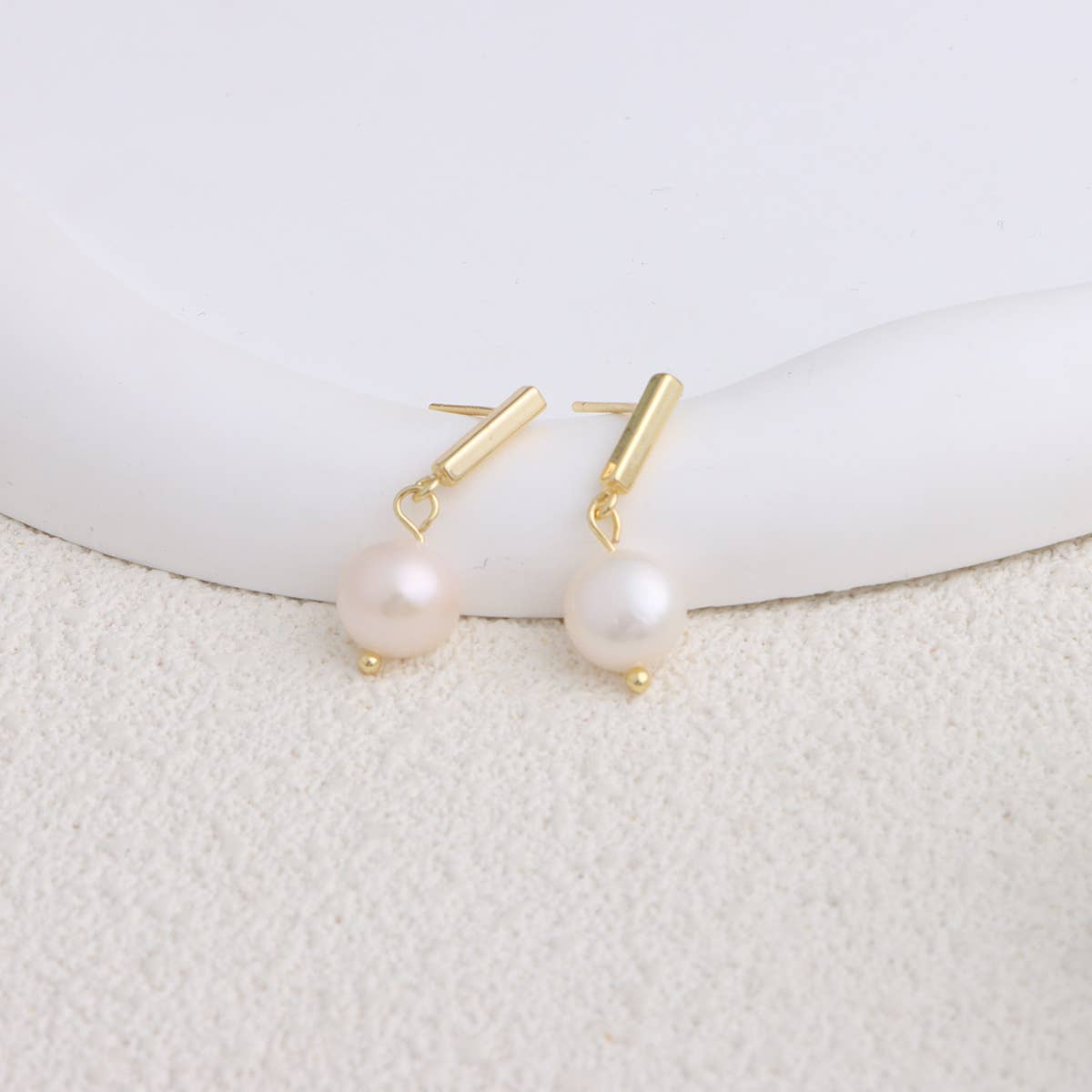 Trendy metal bow freshwater pearl earrings