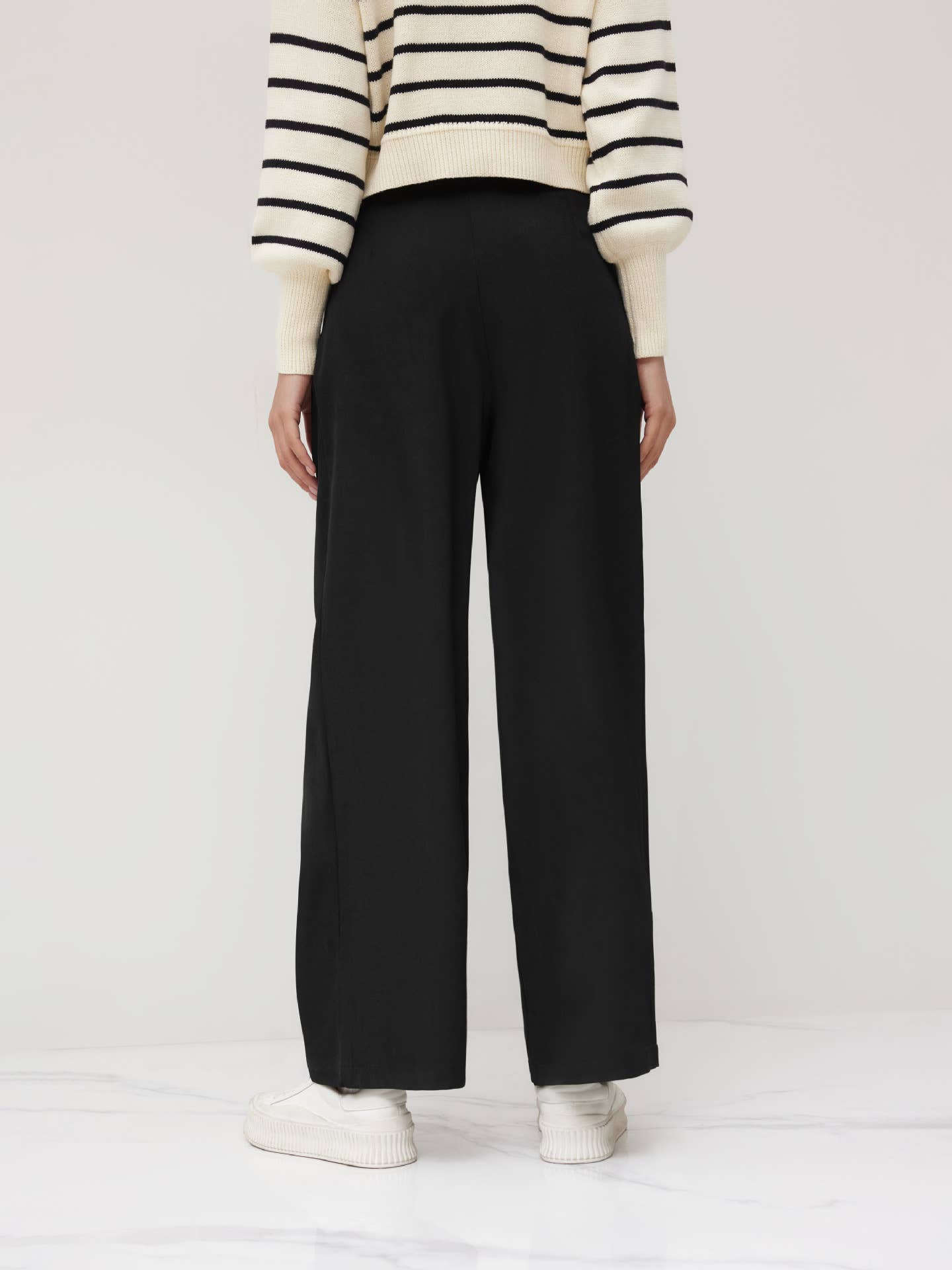 High-waisted straight-leg trousers with a belt