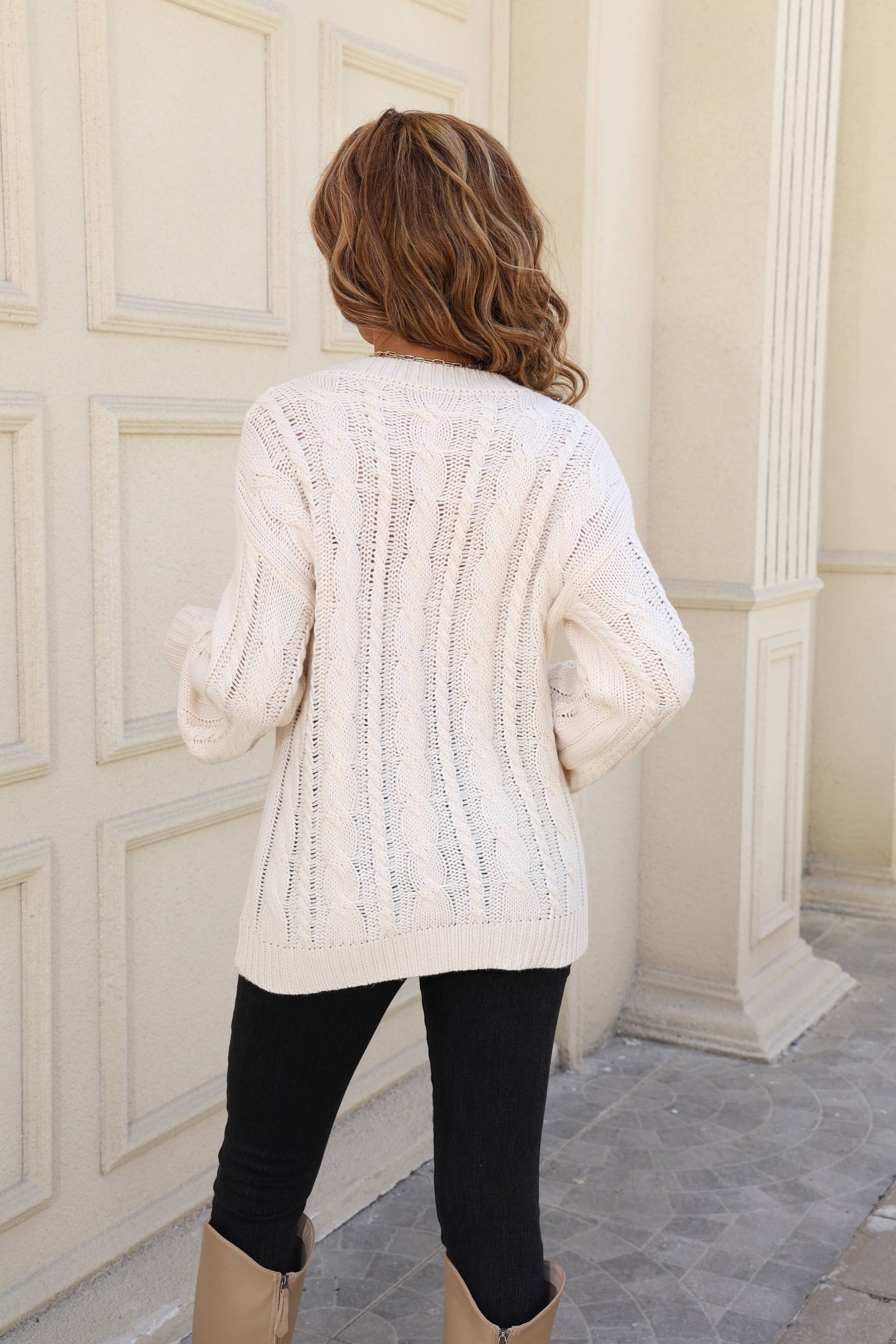 Solid-colored twisted round-neck loose sweater