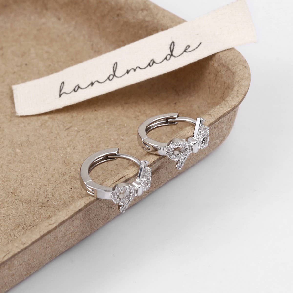 MICRO-INLAID ZIRCONIA BOWKNOT TEMPERAMENT EARRINGS