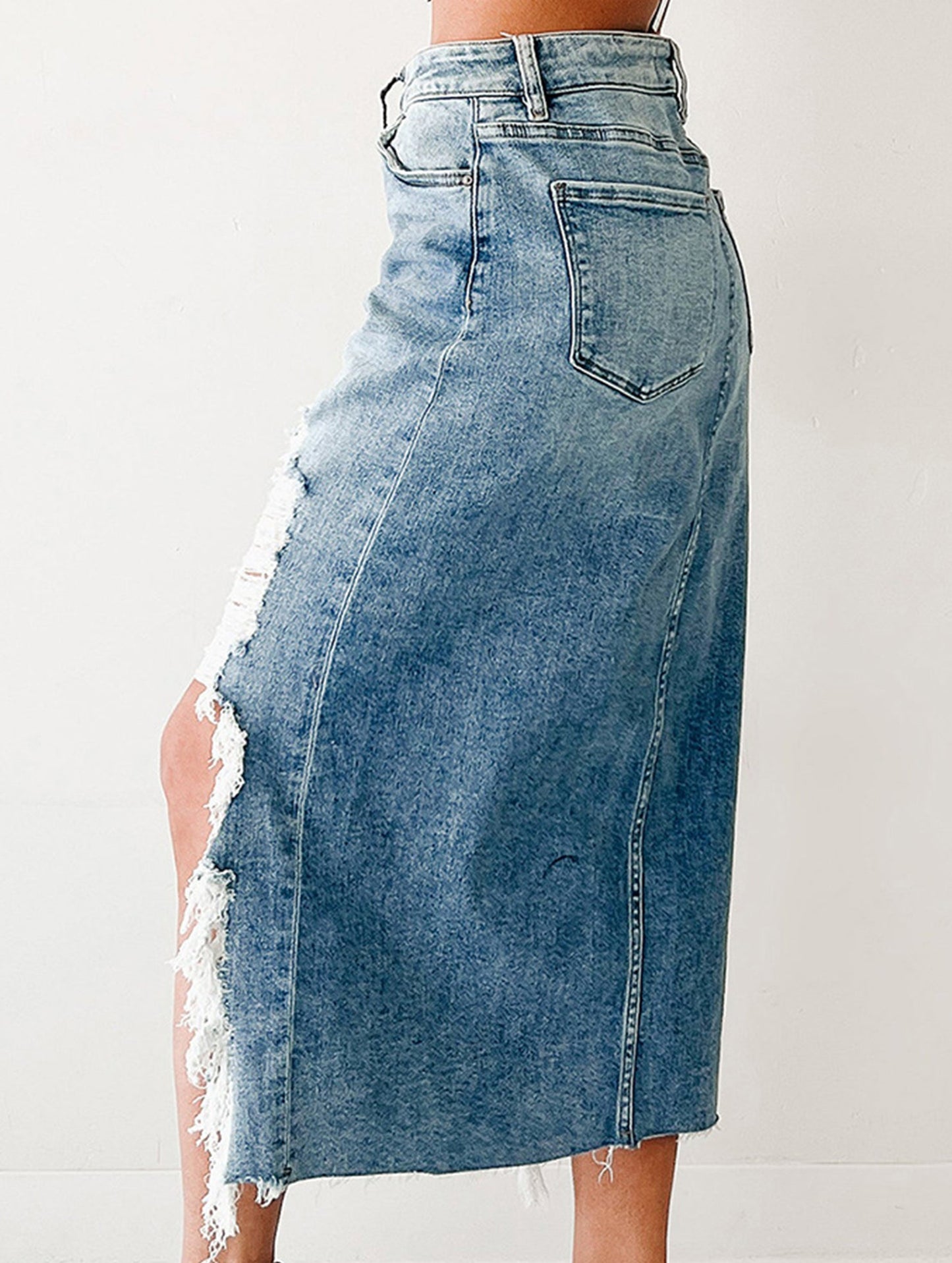 Trendy asymmetrical ripped denim skirt
