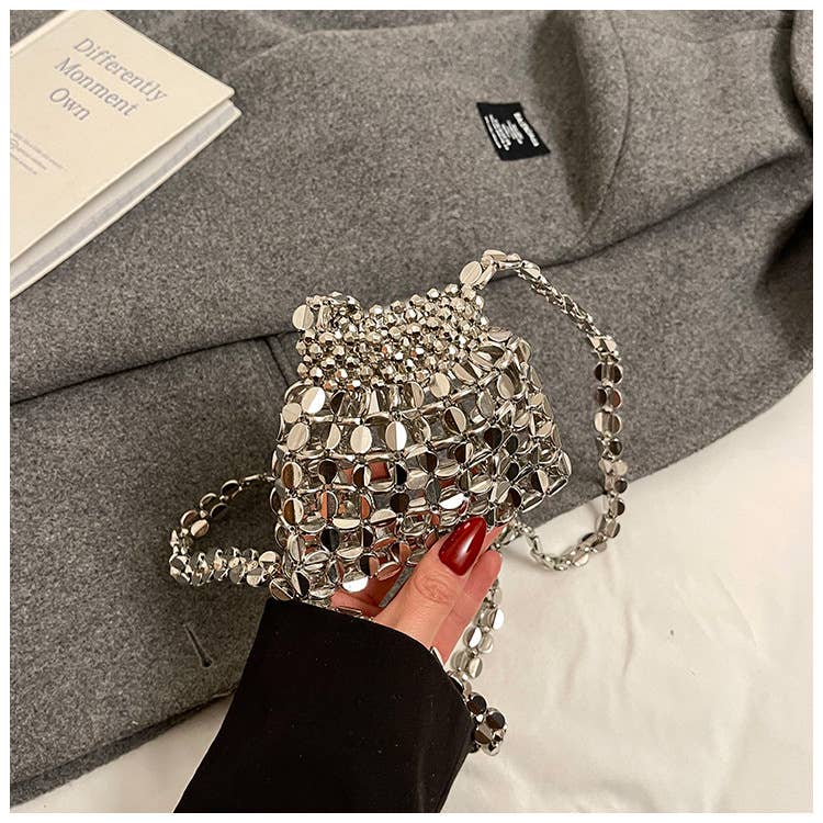 Fashionable hollowed-out glossy crossbody bag