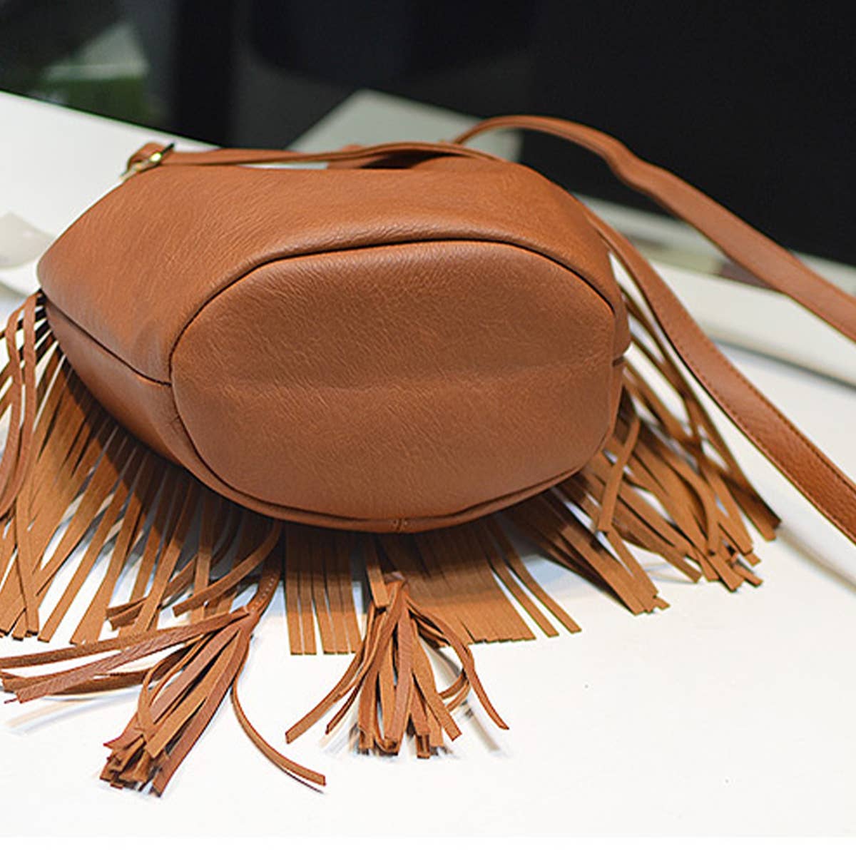 WOMEN LEATHER TASSEL BUCKET BAG_CWAB0791