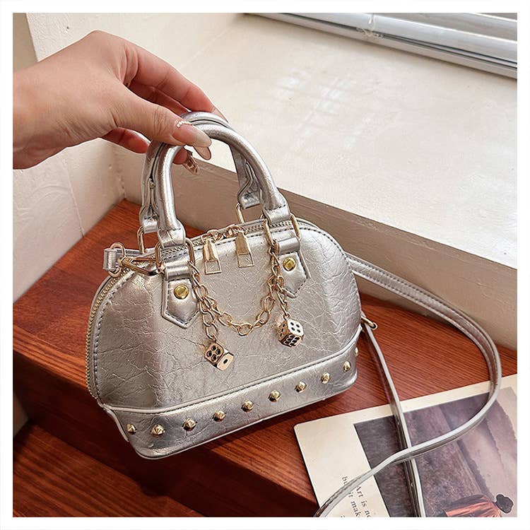 Fashionable riveted single-shoulder bag
