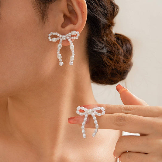 BOW FRENCH TASSEL PEARL EARRINGS_CWAJE1156