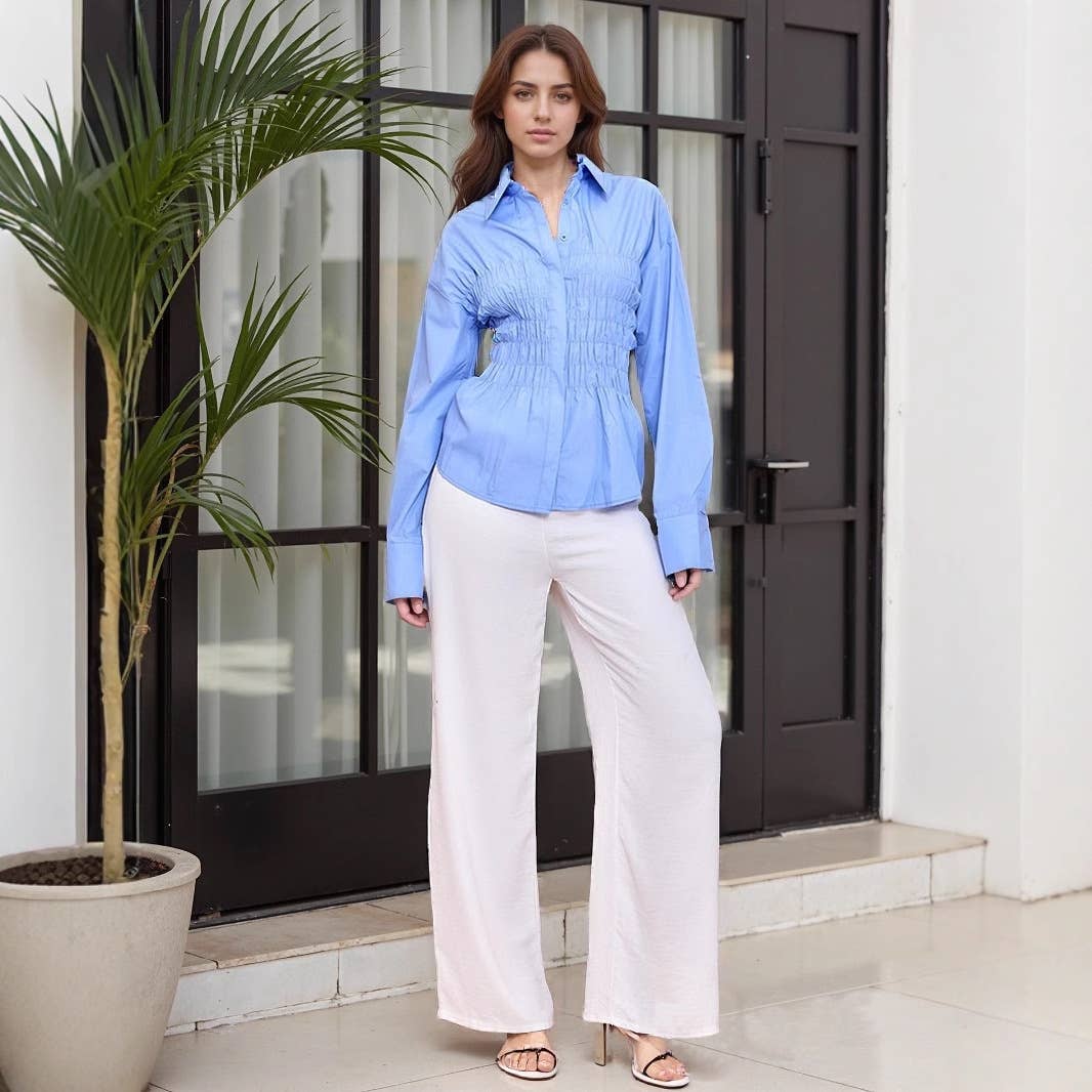 Lapel paired with a pleated cinched-waist shirt