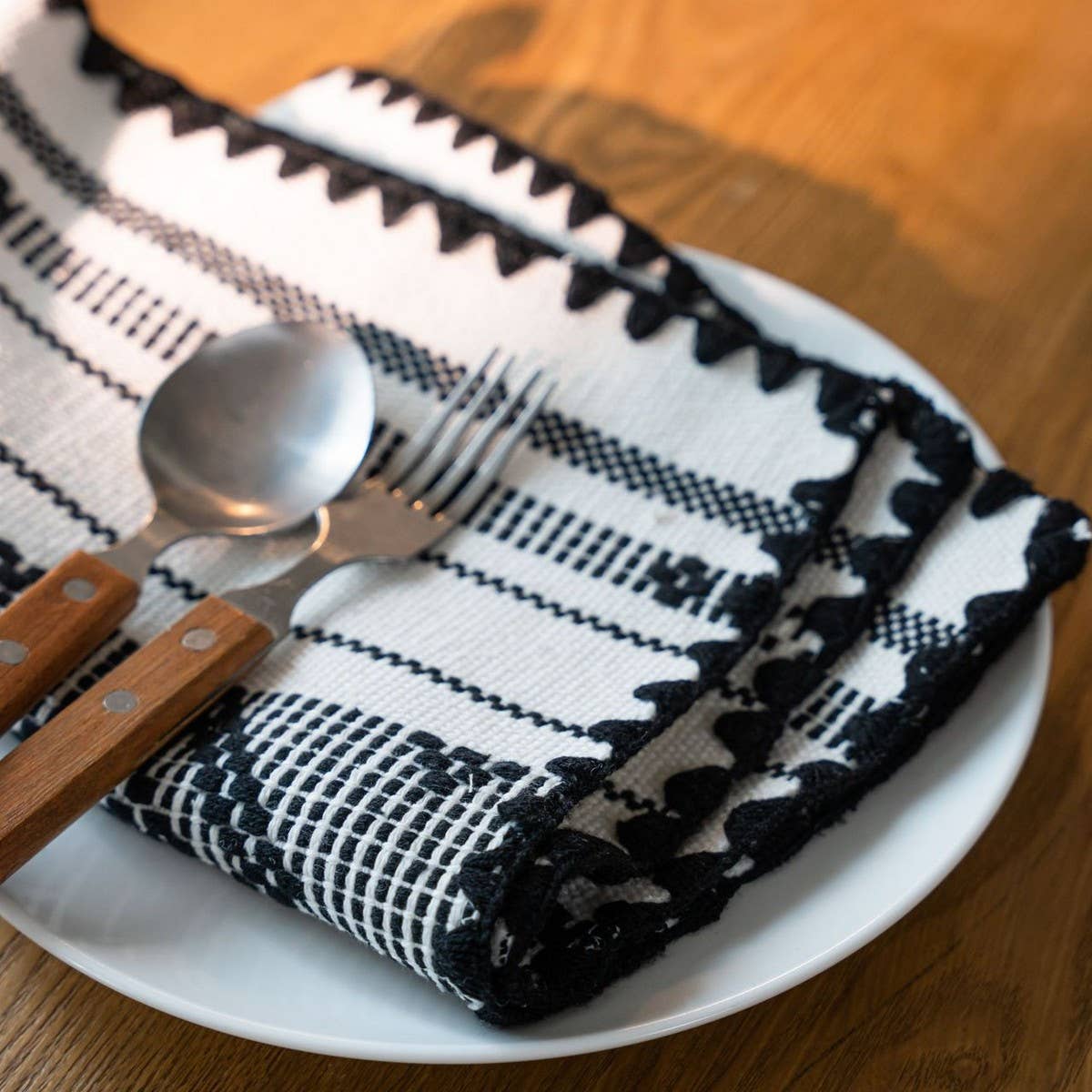 GEOMETRIC TASSEL HOLIDAY TABLE RUNNER