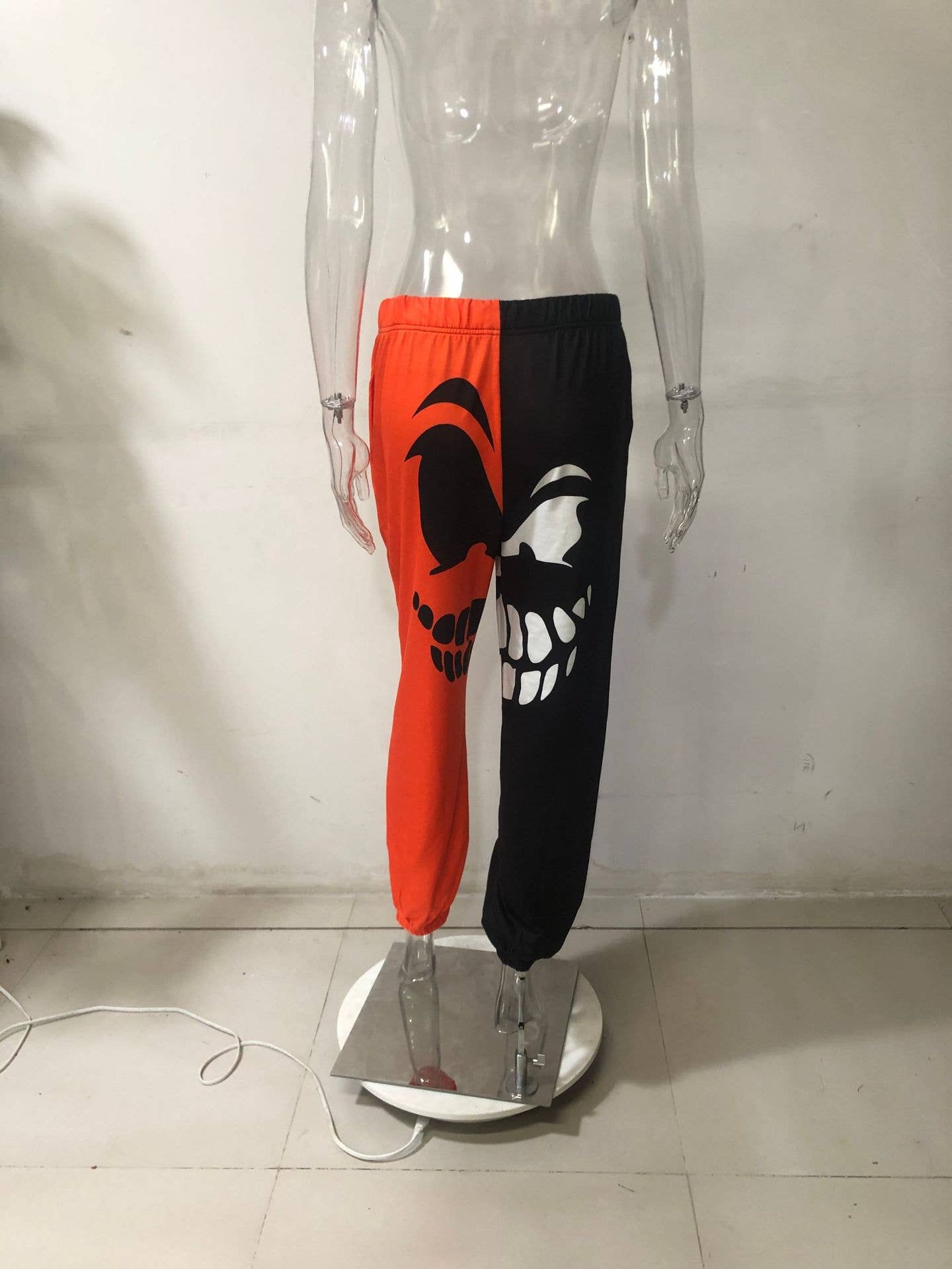 SPORTY BLACK AND ORANGE HARLAN STRAIGHT-LEG PANTS