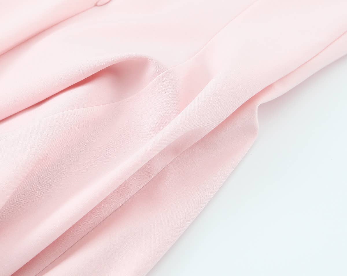 A short halter dress with striped patchwork