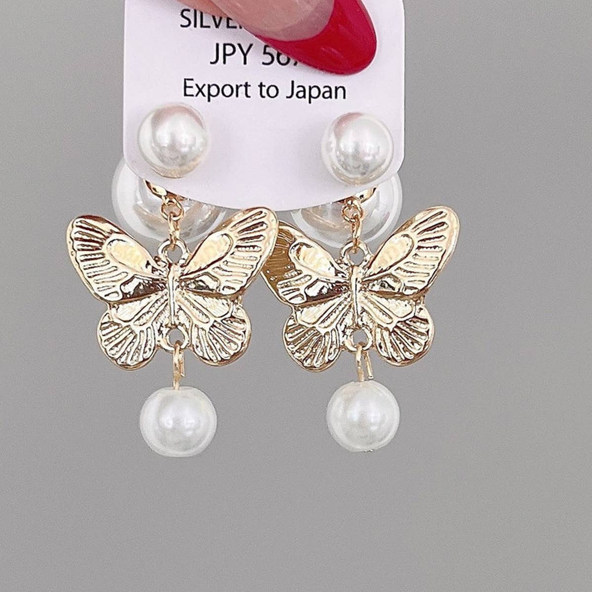 PEARL BUTTERFLY TASSEL EARRINGS_CWAJE2037