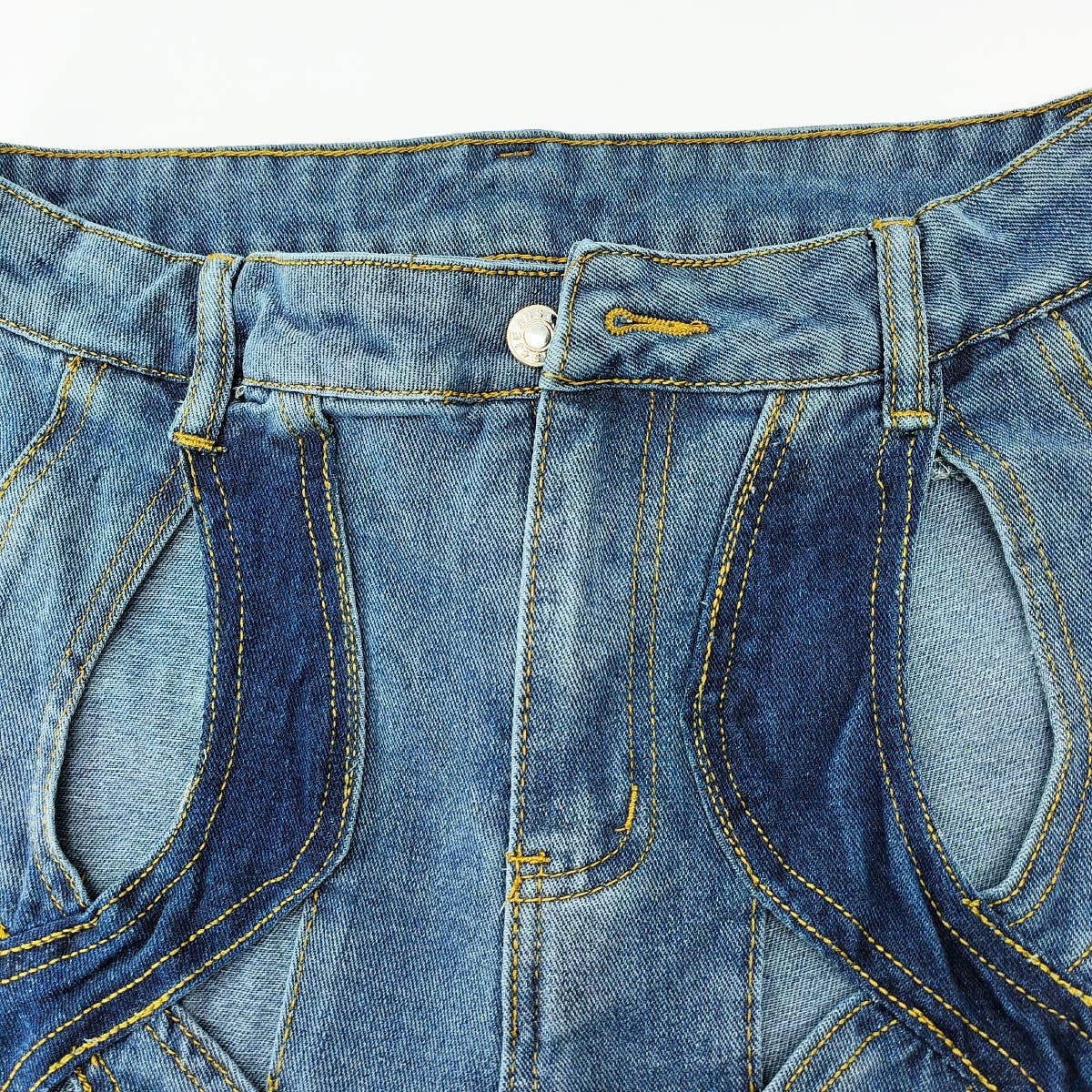 SPLICED CONTRASTING HOLLOW OUT JEANS_CWJP0189