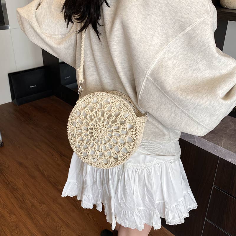 Fashionable hollowed-out woven crossbody bag