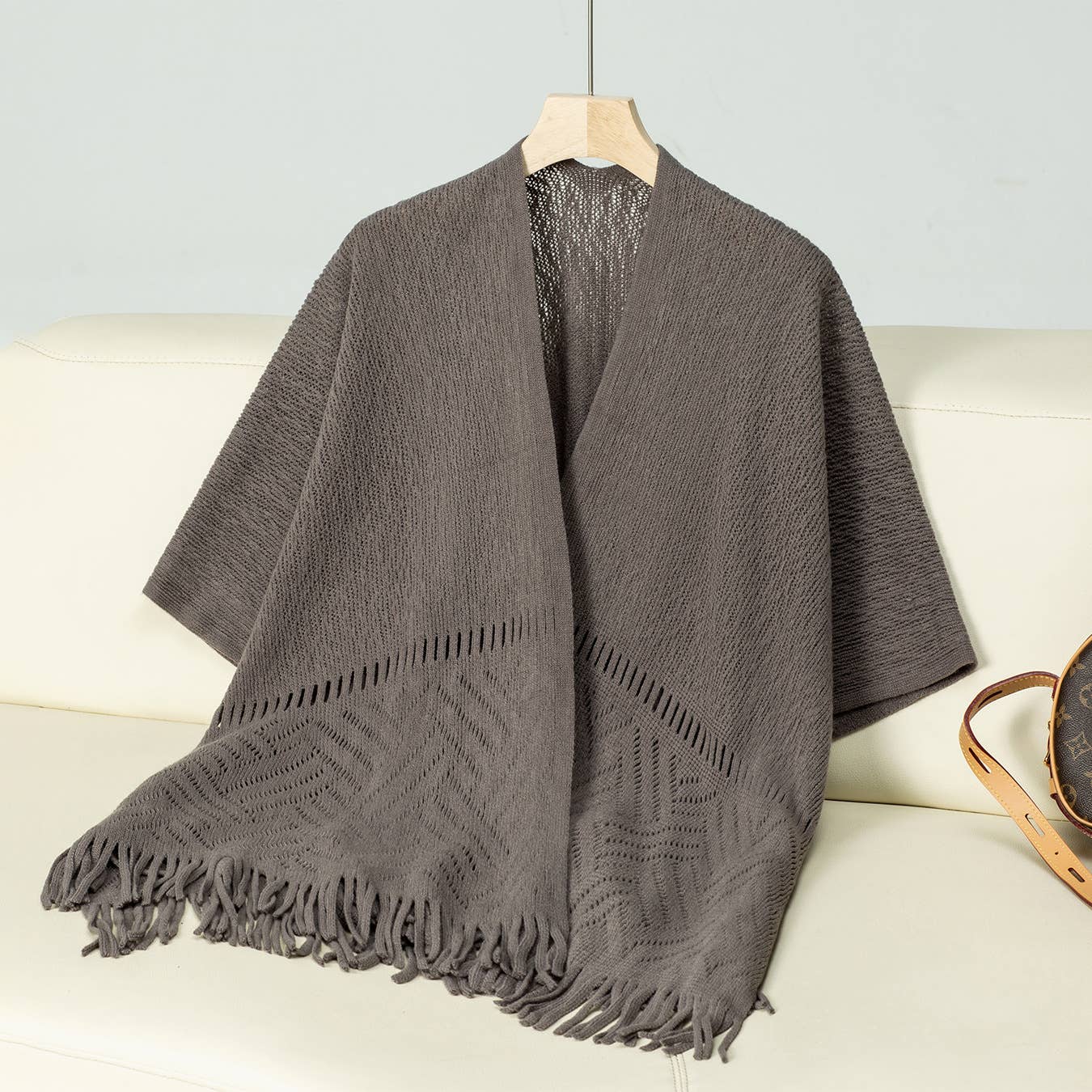 Solid colour hollow knit tassel cape cape
