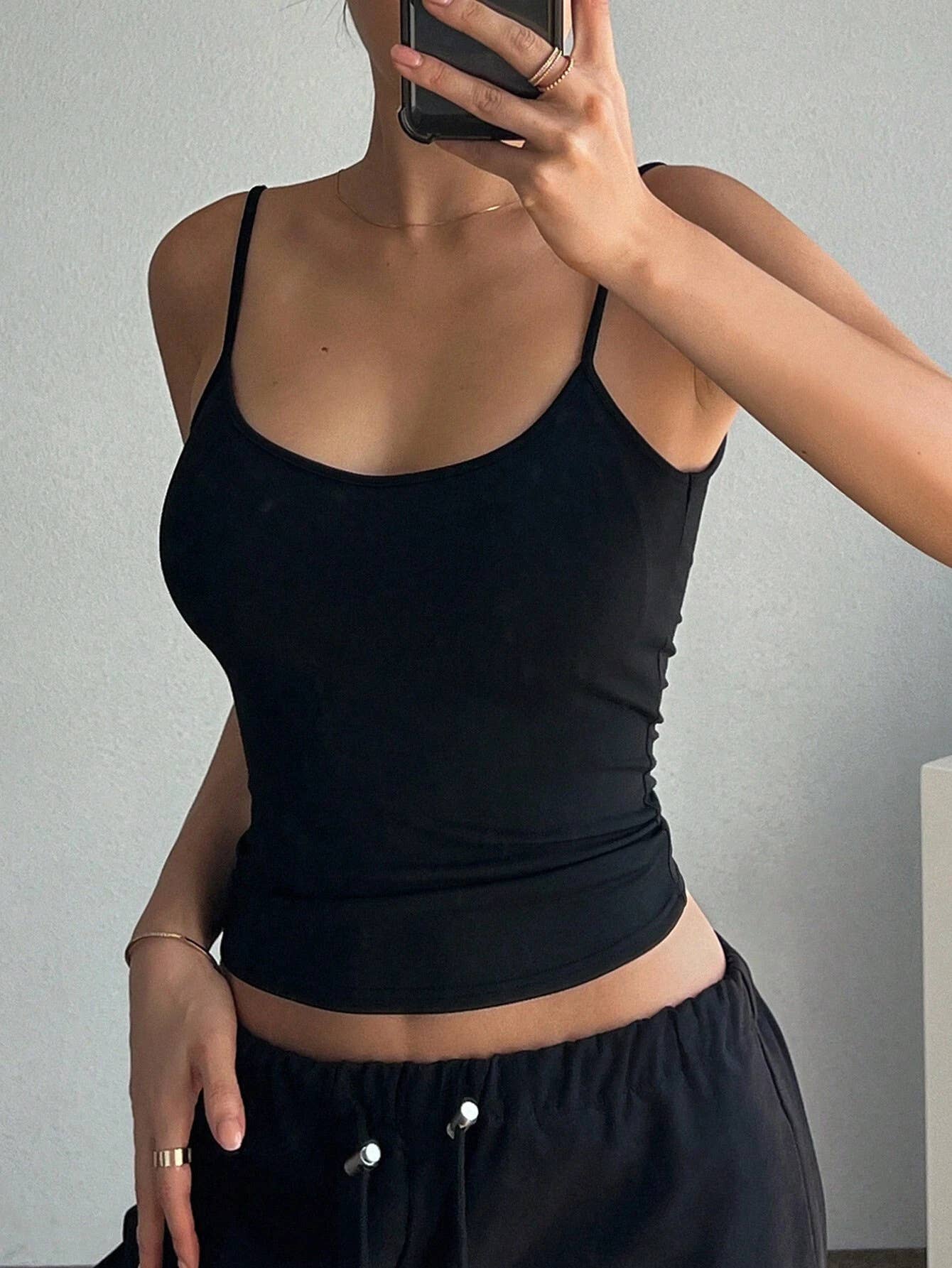 Solid-color backless, form-fitting halter top