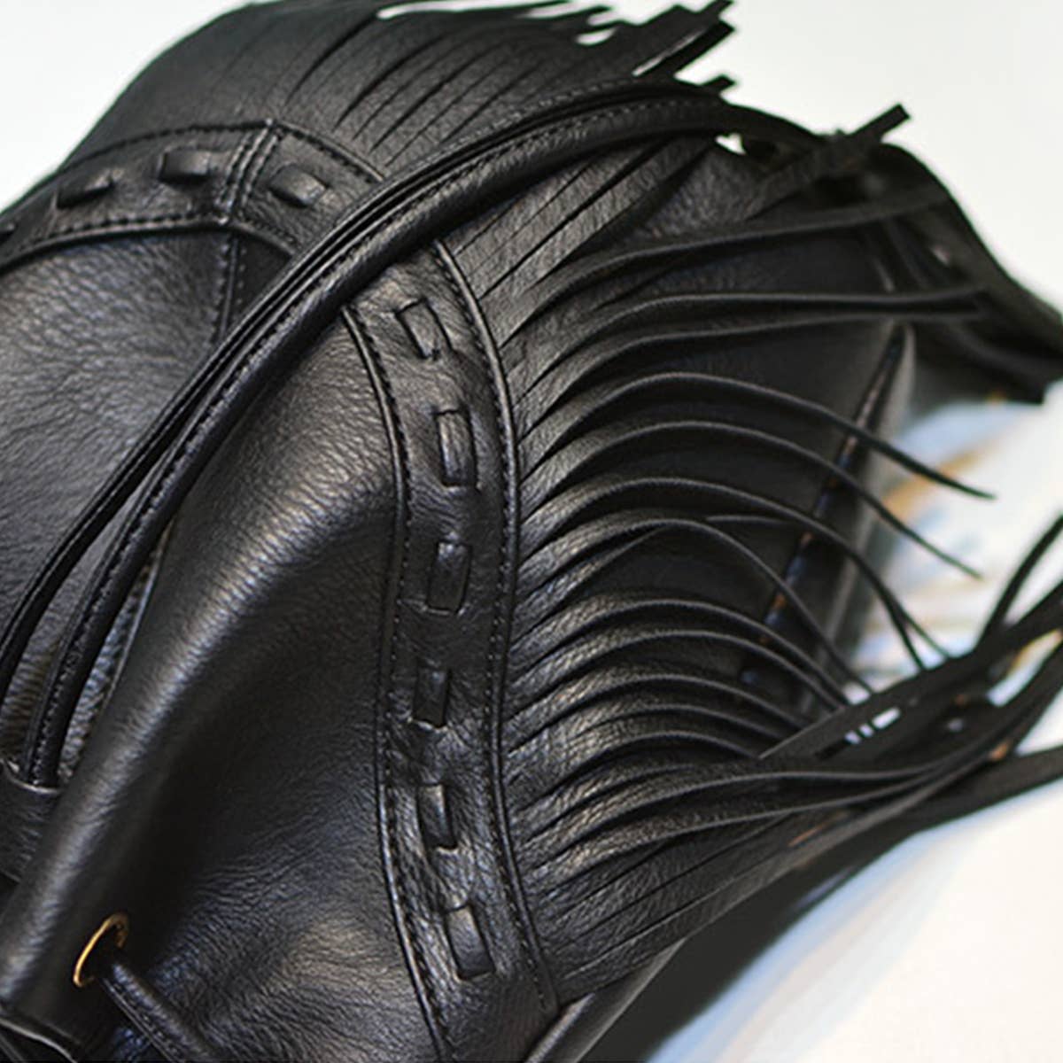 WOMEN LEATHER TASSEL BUCKET BAG_CWAB0791