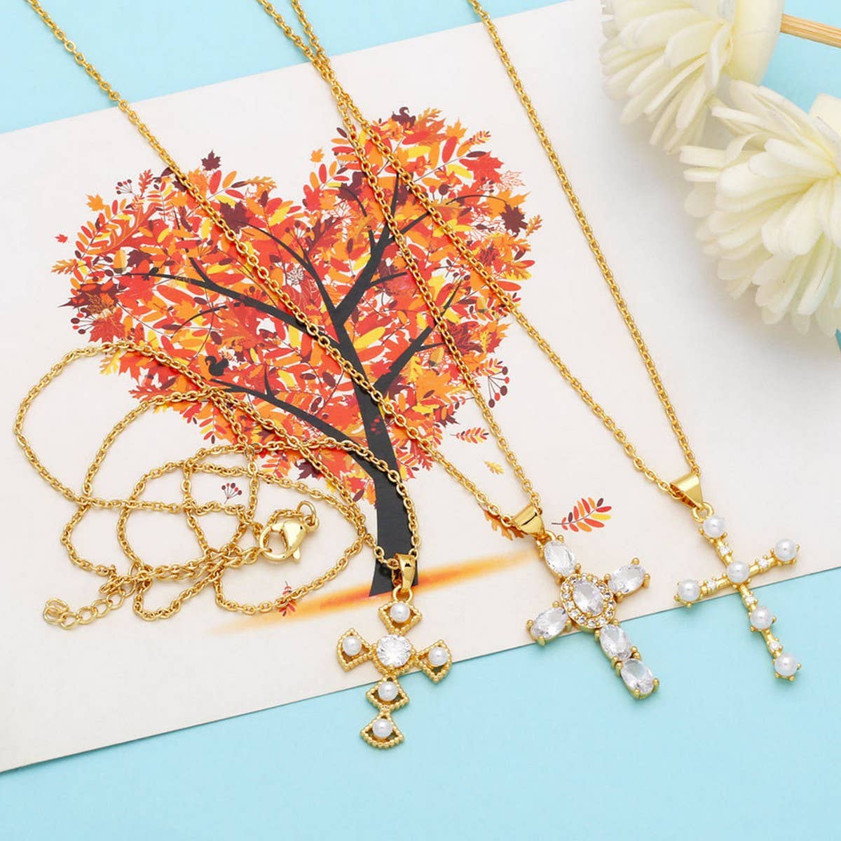 DIAMOND STUDDED PEARL CROSS PENDANT NECKLACE