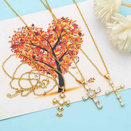 DIAMOND STUDDED PEARL CROSS PENDANT NECKLACE