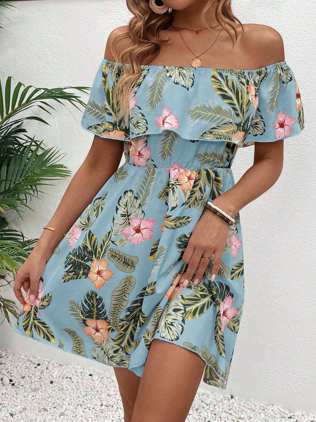 A fashionable printed one-shoulder ruffled dress