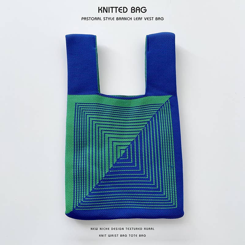 Heart-shaped color-blocked knitted handbag