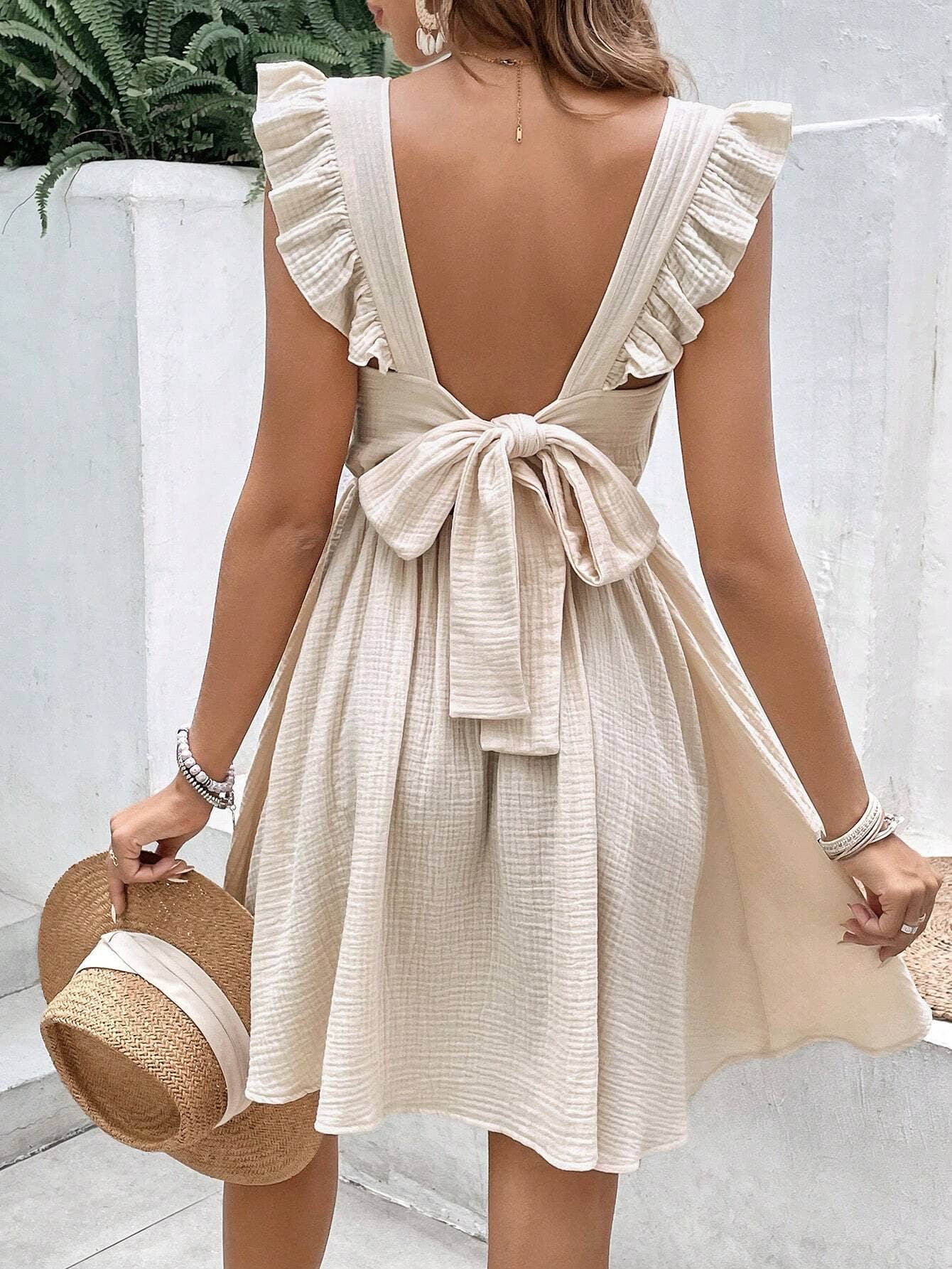 Backless ruffled solid-color cinched-waist dress
