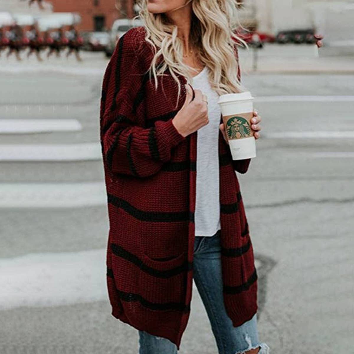 Striped women's loose long unbuttoned knit cardigan