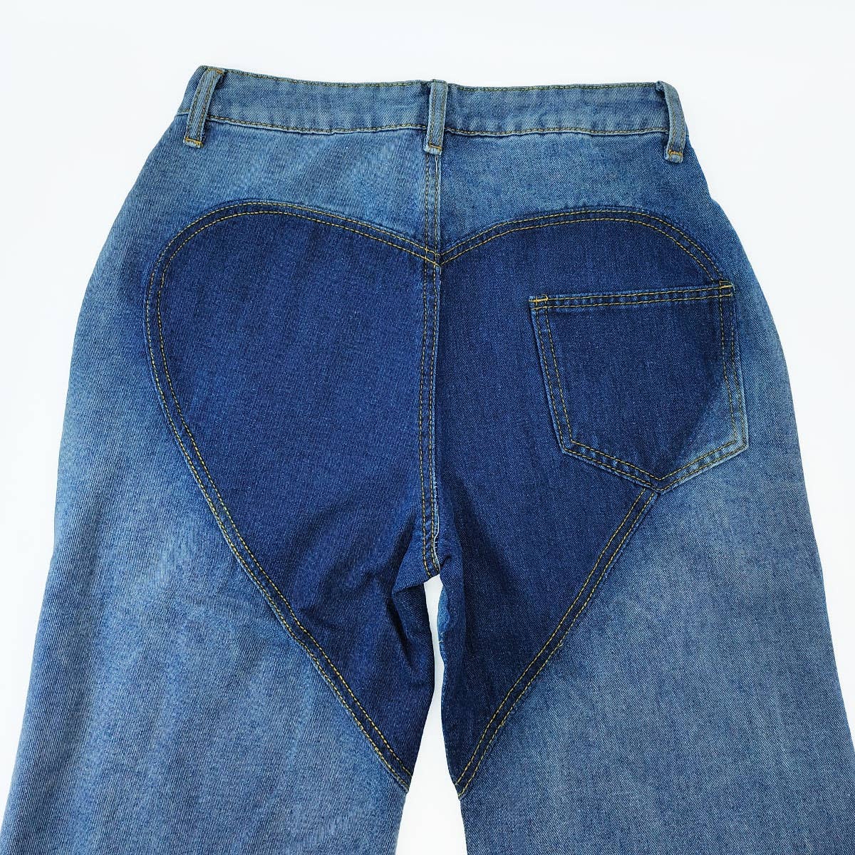 SPLICED CONTRASTING HOLLOW OUT JEANS_CWJP0189