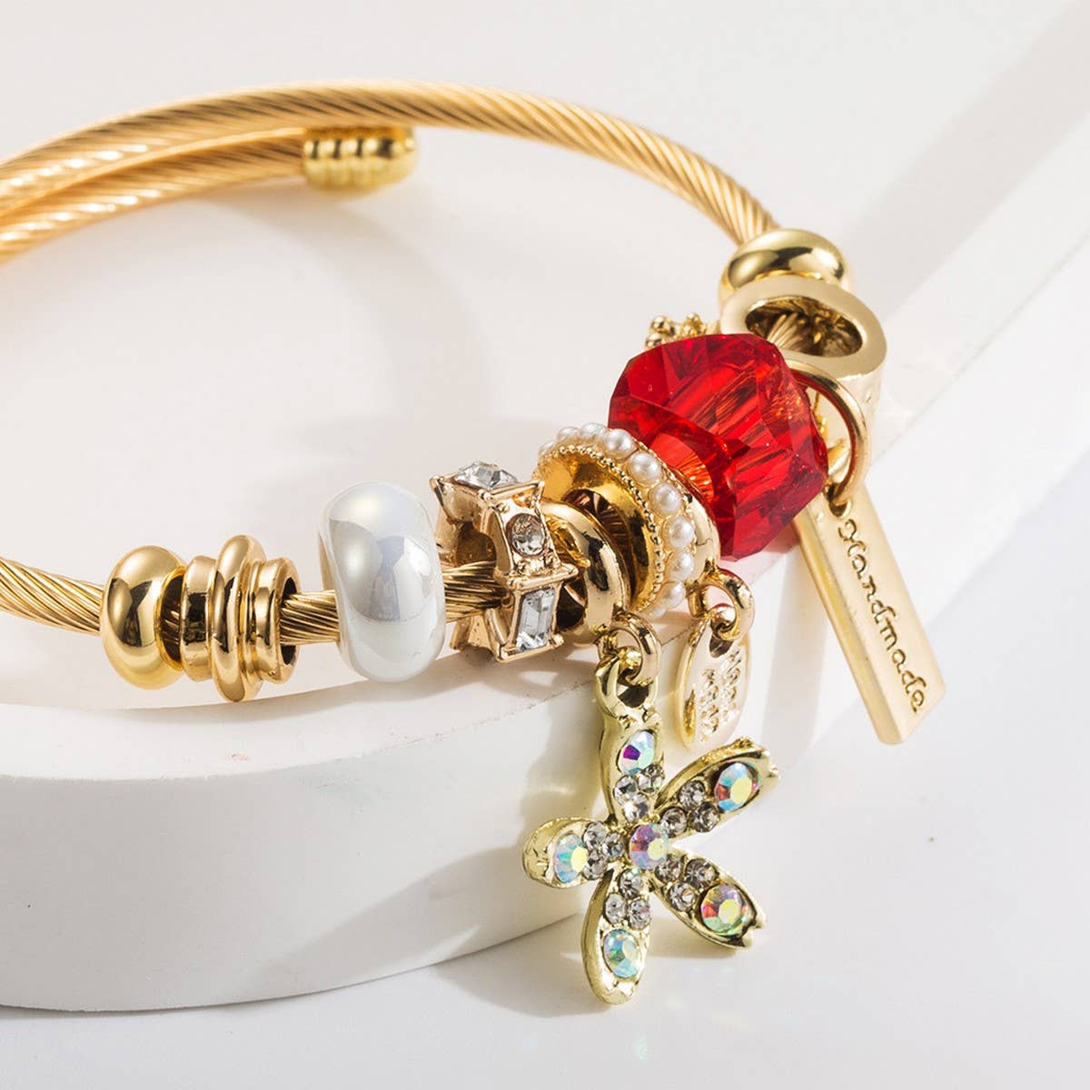 Gold Stainless Steel Bracelet with Flower Pendant