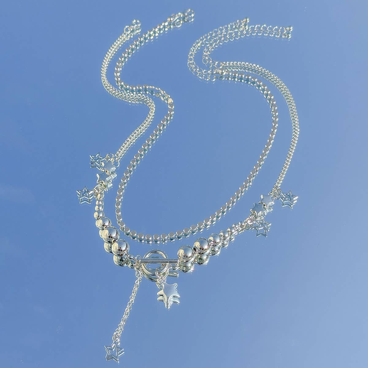 BEADED NECKLACE WITH STAR SHAPED PENDANT TASSELS_CWAJE1158