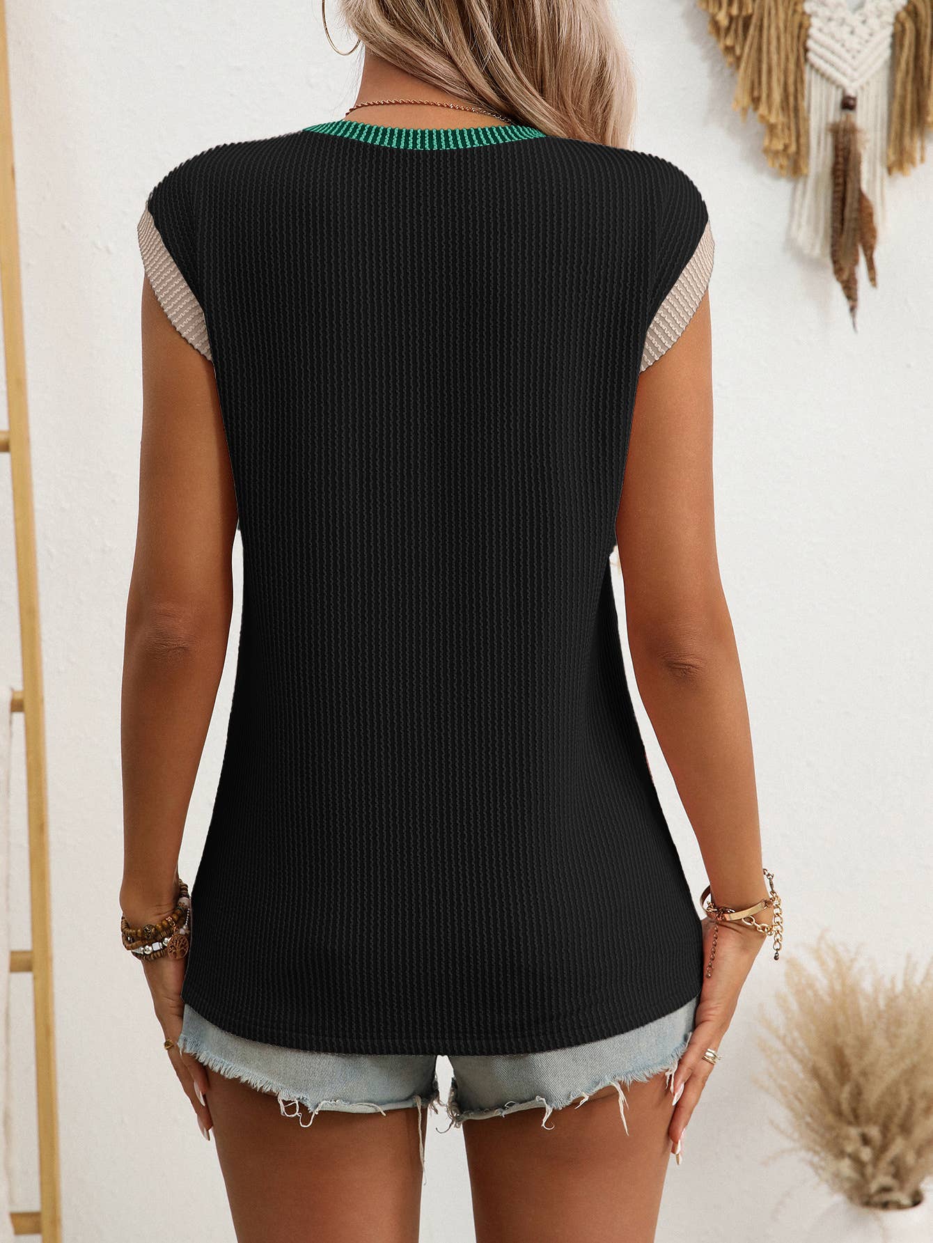 Twisted outer seams color-matched vest