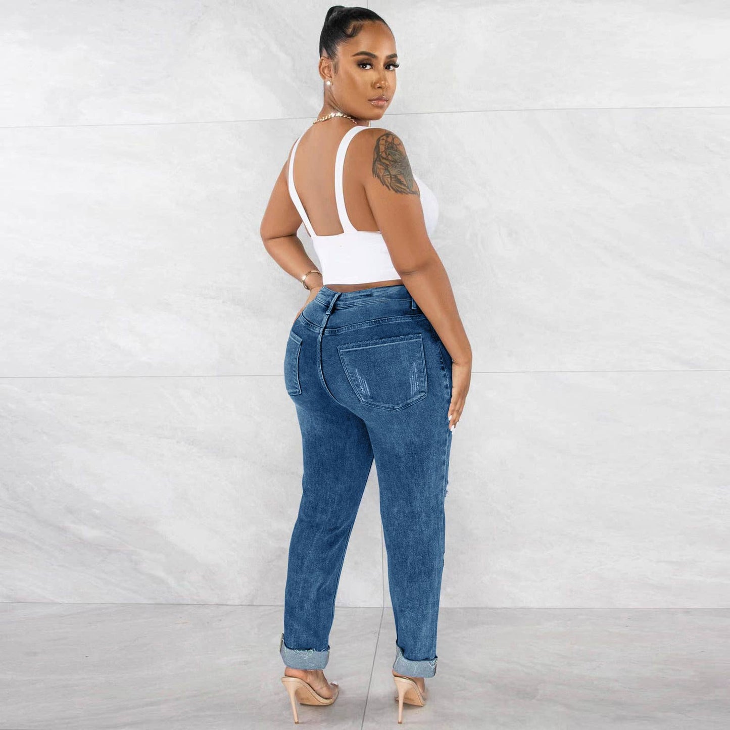 Slim fit ripped high-waisted skinny jeans